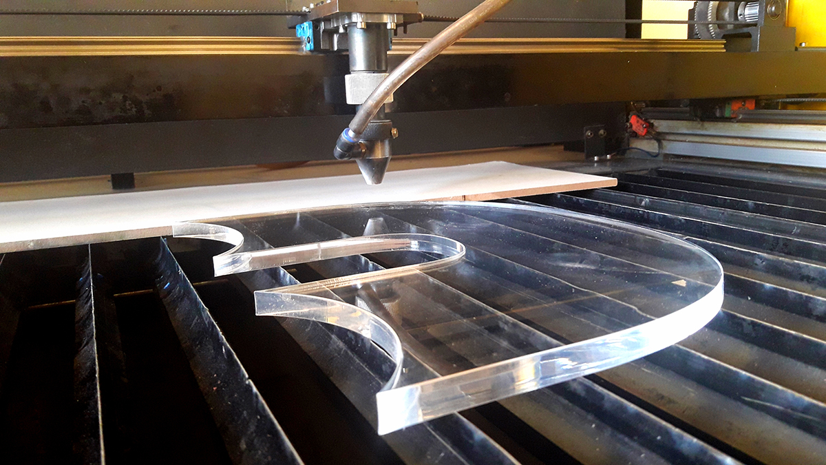 CNC cut curved clear acrylic piece